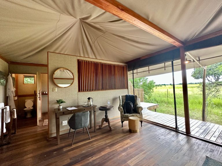 Botswana safari: safari tent interior with desk and deck